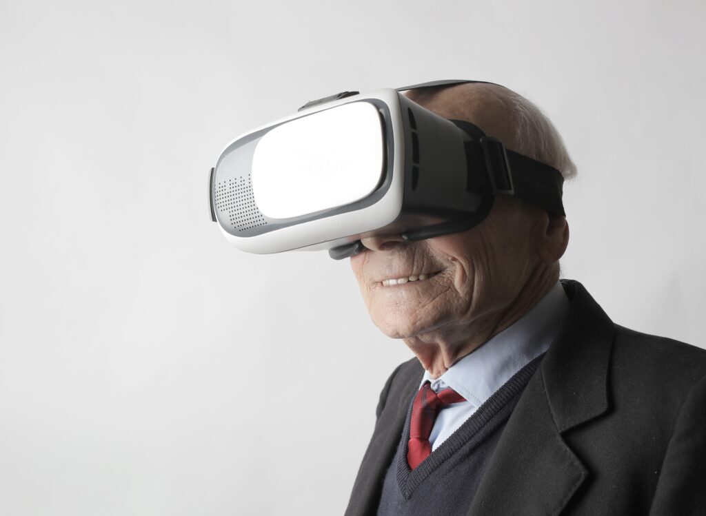 Elderly person enjoying Virtual reality glass