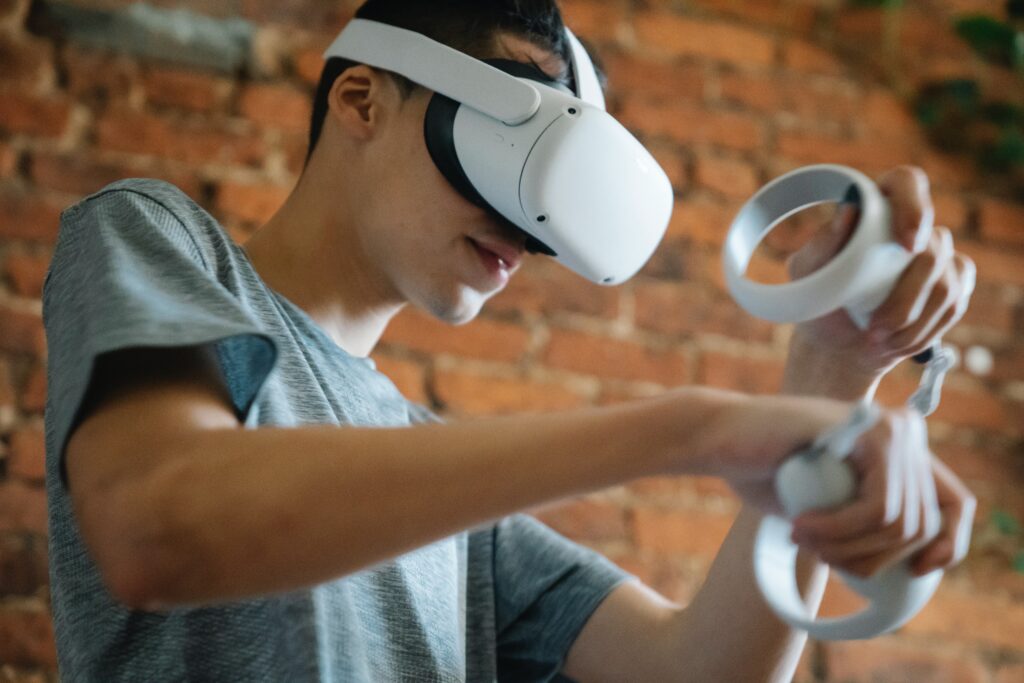 Person enjoying gaming in VR glass